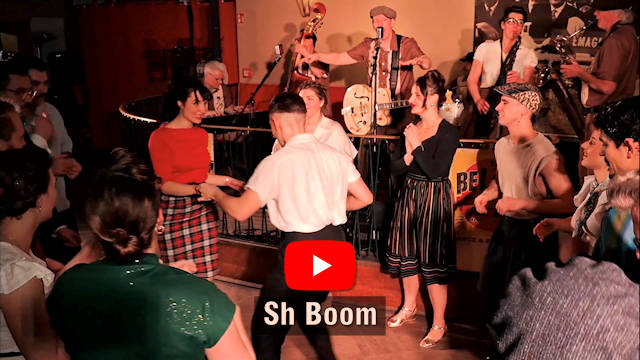 The image shows dancers in front of a stage with a band. Below is the song title "Sh Boom" with the YouTube logo above it.